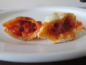 Illustration for article titled Frozen-Food Smackdown: Totino's Pizza Rolls Vs. Hot Pockets Snack Bites